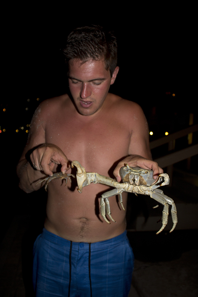 Playing with crabs. He named these crab shack and crab cakes. lol