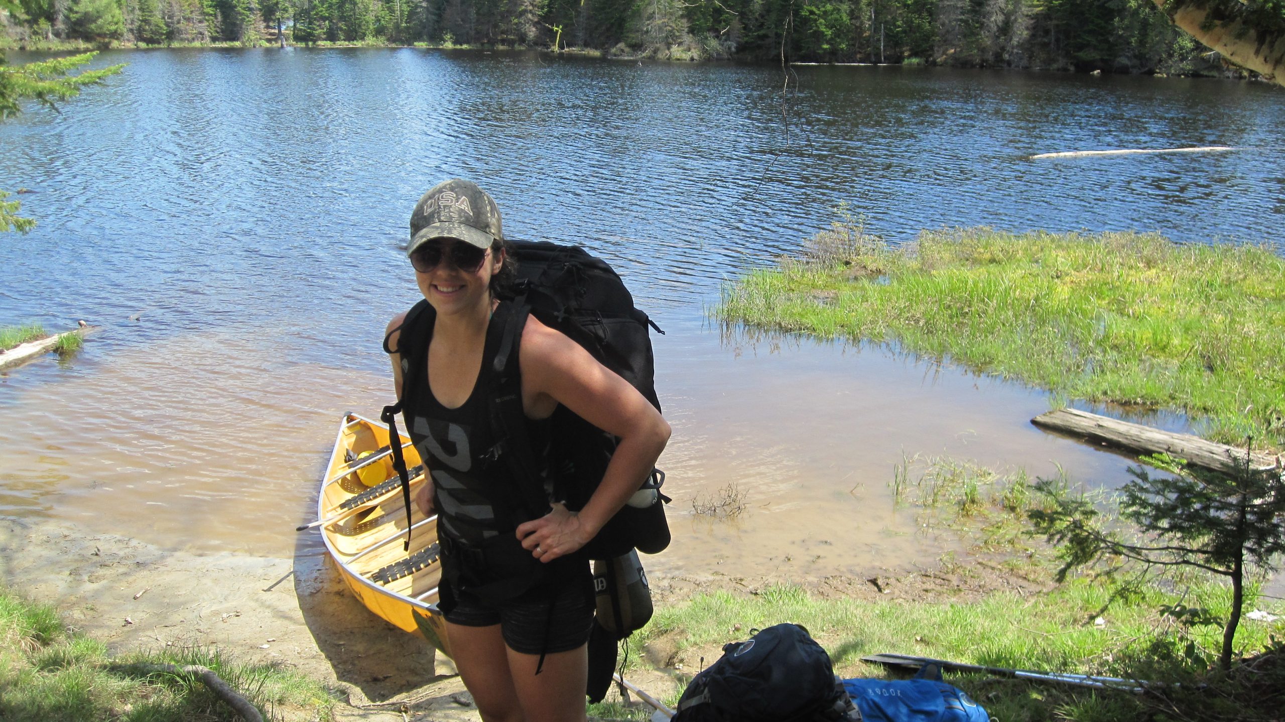 Pre - mile and half portage and getting eaten alive by mosquitos, 